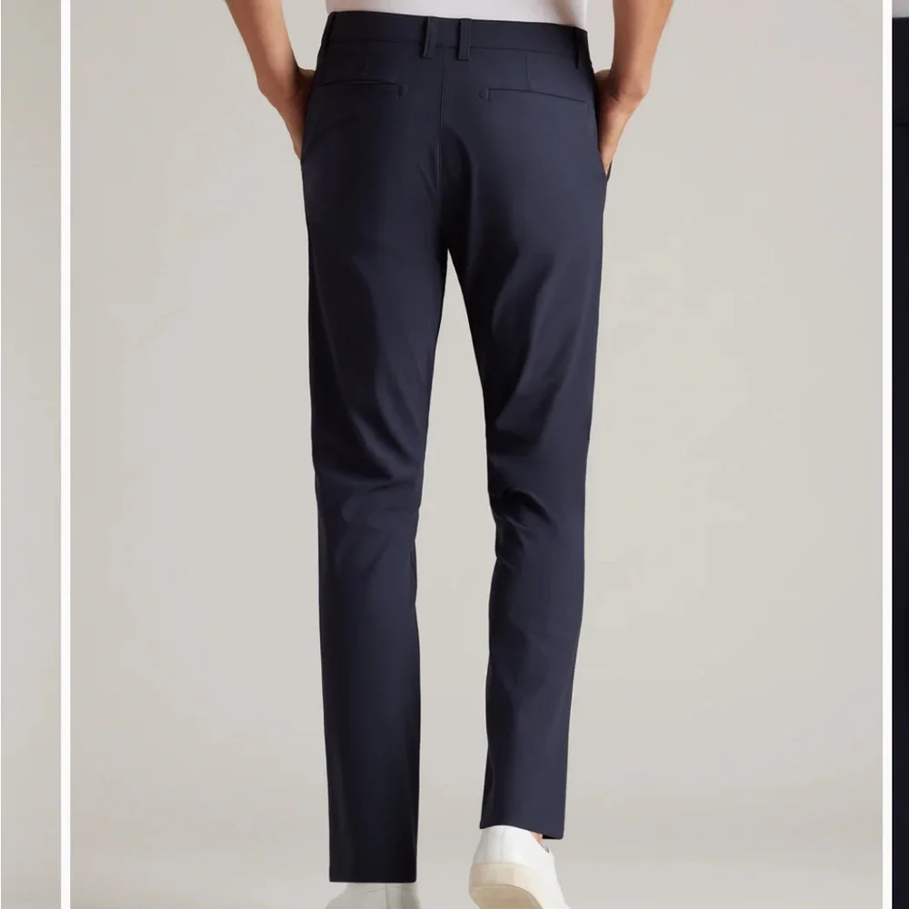 Rhône commuter slim pants in navy 31” - elevated performance work pant